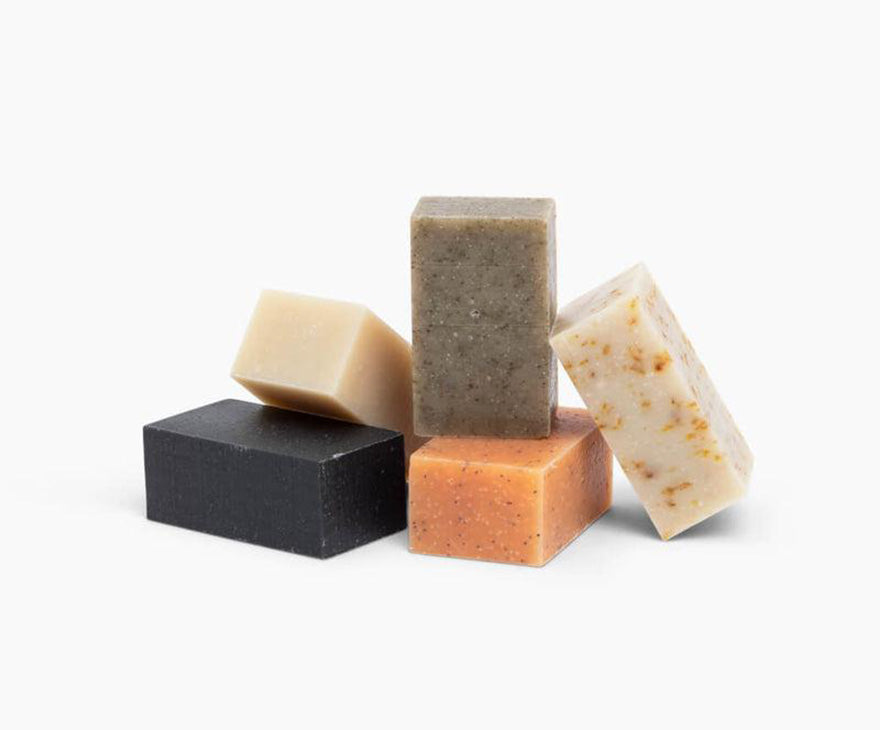 a pile of different soap bars