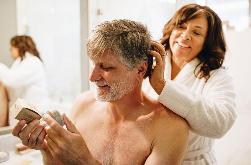 man holding shampoo bar